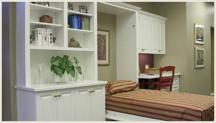 wall bed with white custom cabinetry