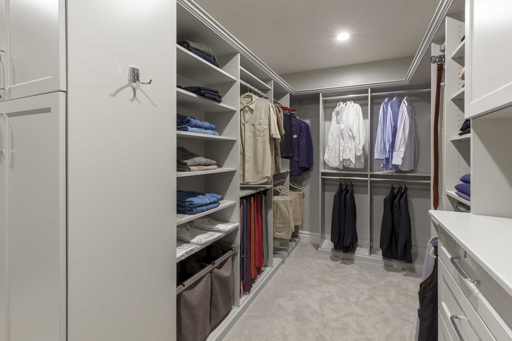 Walk-in closet with mens apparel